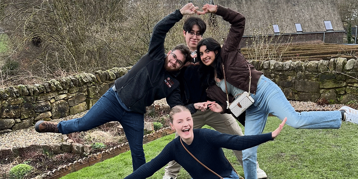 Students pose on the campus of Durham University in Durham, England, where they took on the Durham debate team. 